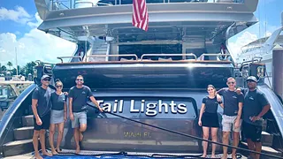 The crew of motor yacht Tail Lights