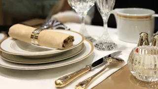 Fine china and crystal with table linens