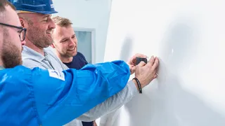 Glossy superyacht topcoat finish achieved using Awlgrip coatings system
